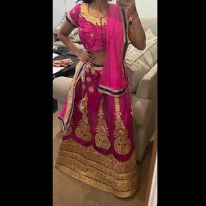 Rani pink net embroidered lehenga wedding indian